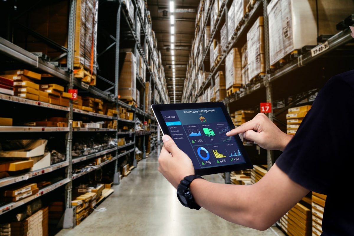 Smart,Warehouse,Management,System.worker,Hands,Holding,Tablet,On,Blurred,Warehouse